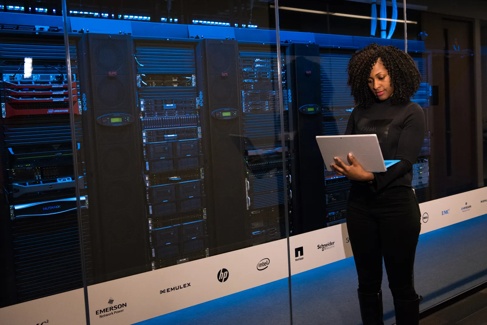 Engineer reviewing server infrastructure for SaaS reliability risks